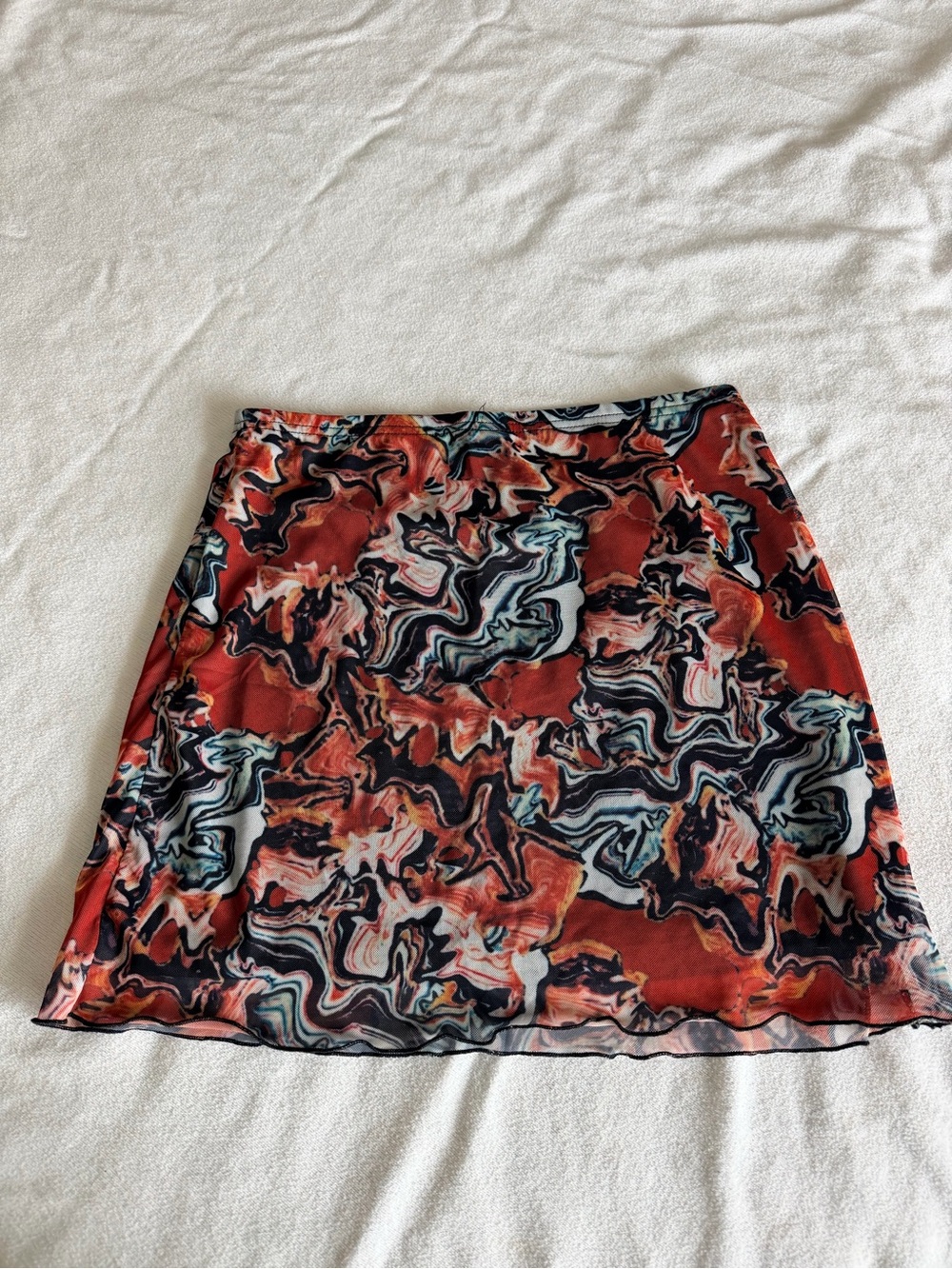 Red Marble-Print Mini Skirt with Abstract Swirl Pattern